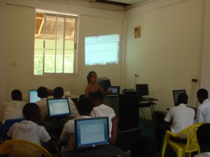 Abena conducting a computer workshop