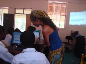 Abena working with a computer student